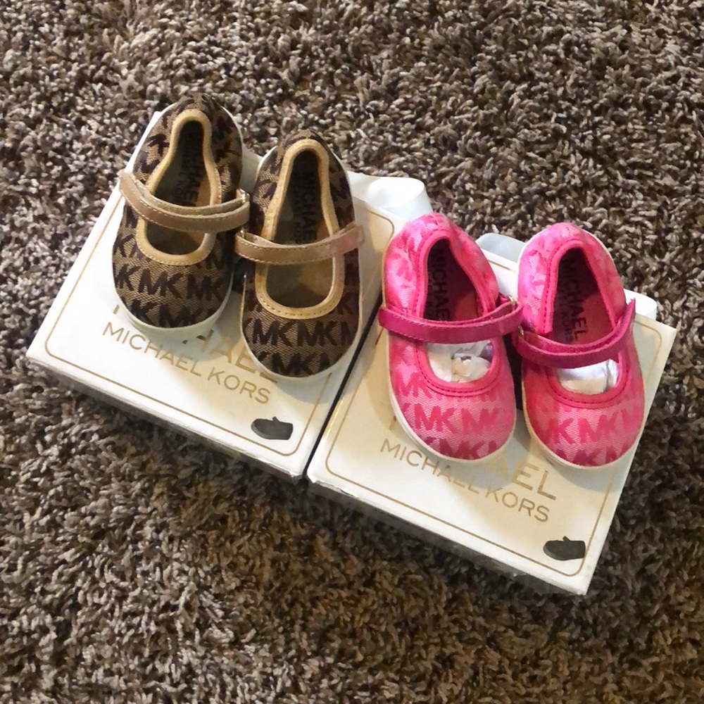 Two pair of Michael Kors Shoes